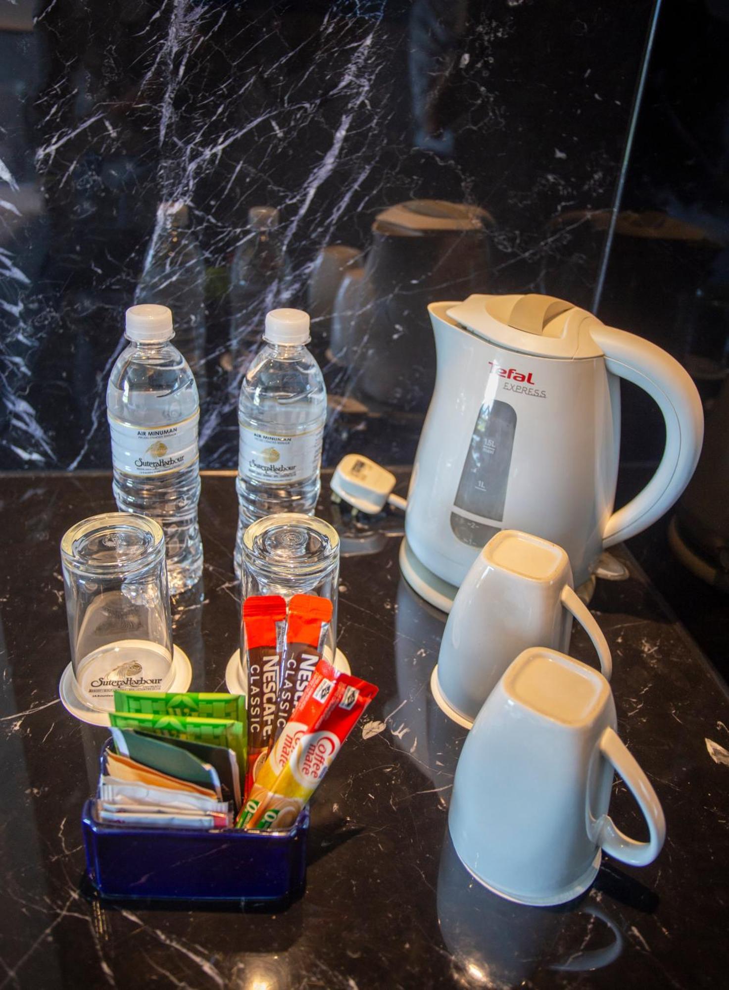 The Pacific Sutera Hotel Kota Kinabalu Exterior photo A kettle with bottled water and coffee